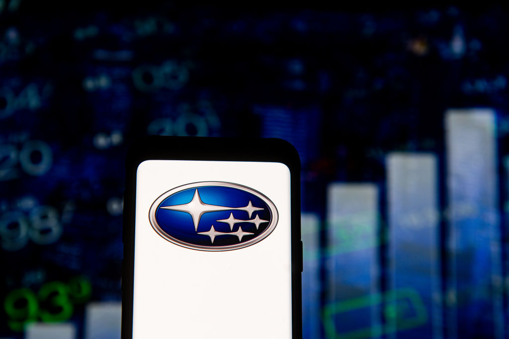 The Subaru logo seen in front of a chart