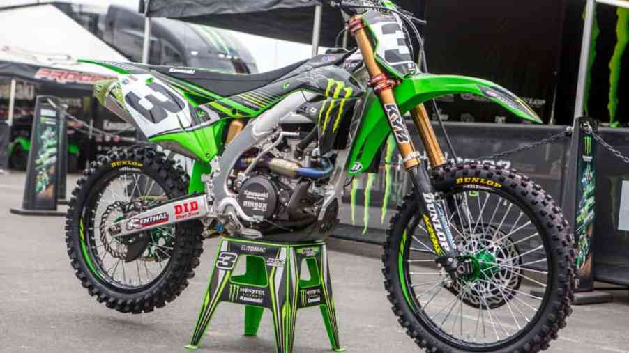 Eli Tomac's green dirt bike on the stand