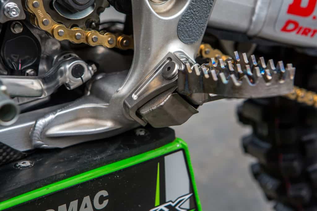 Aggressive, custom made titanium Kawasaki Footpegs on Eli Tomac's race bike