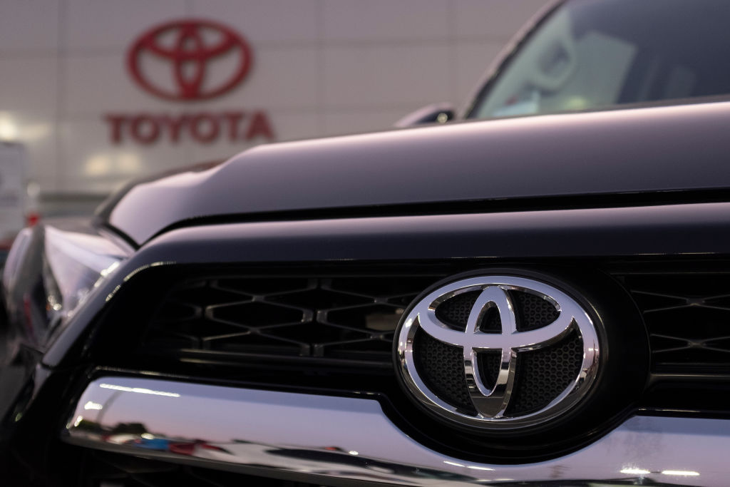 Toyota logo is seen on a Toyota 4Runner at its dealership in San Jose, California on August 27, 2019