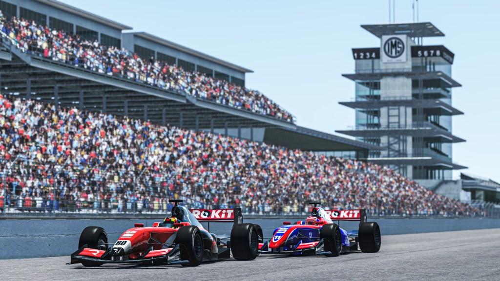 Indy cars racing nose to tail at the Indianapolis Motor Speedway
