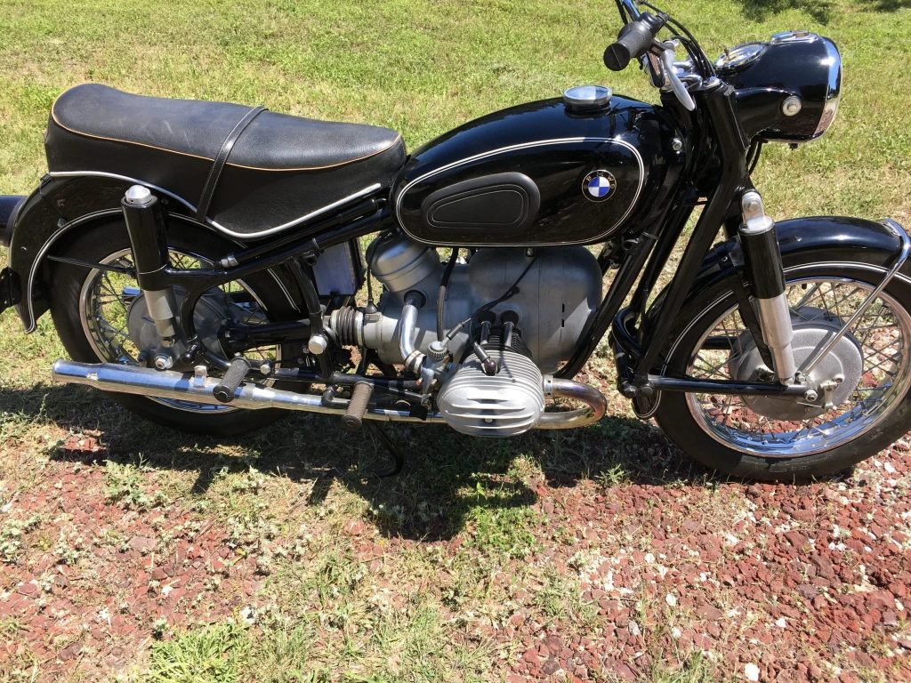 Black 1959 BMW R60 on the lawn