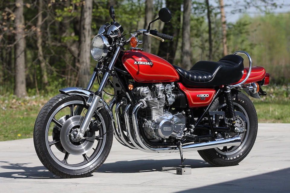 Red 1976 Kawasaki KZ900 LTD in front of a forest
