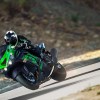 a sparkly green ninja zx-14r raging down the road at high speed