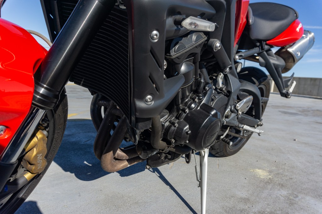 Close-up of the 2012 Triumph Street Triple R's 675cc three-cylinder engine