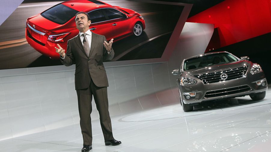 The 2013 Nissan Altima being introduced at an auto show