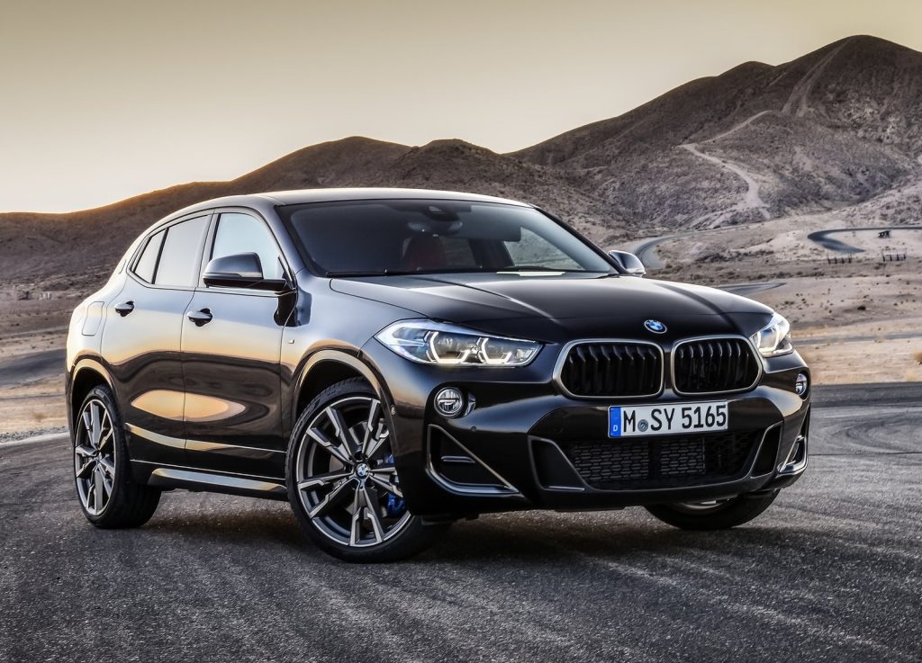 Black 2019 BMW X2 M35i parked on a desert racetrack