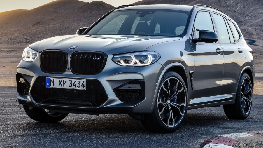 Gray 2020 BMW X3 M Competition crossover parked on a racetrack.