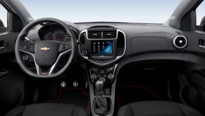 The all black interior of the 2020 Chevy Sonic.