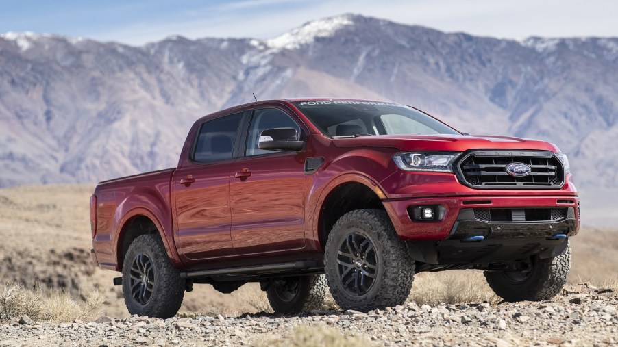 Red 2020 Ford Ranger with Ford Performance Level 2 Package in the desert in front of a mountain range