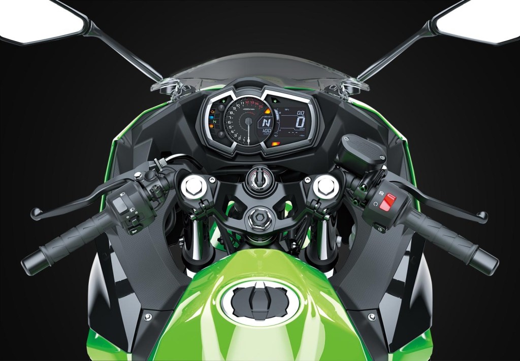 Green 2020 Kawasaki Ninja 400 rider perspective view, showing digital display and handlebars