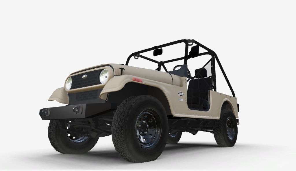 A tan 2020 Mahindra Roxor. Similarities to the Jeep Wrangler can't be denied.