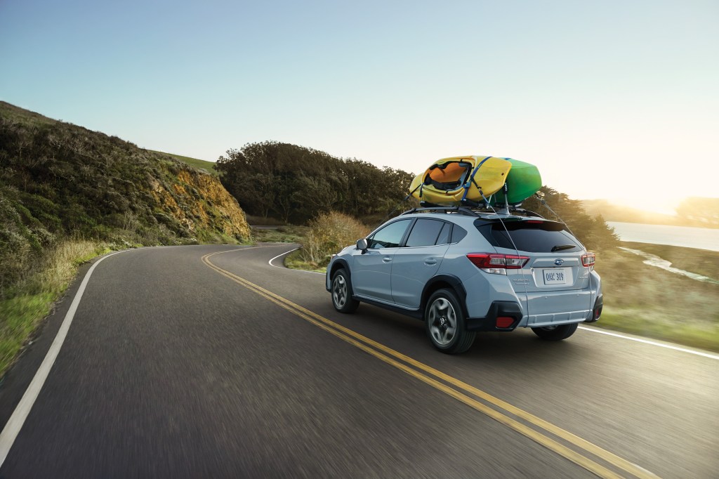 A light blue 2020 Subaru Crosstrek  on the track.