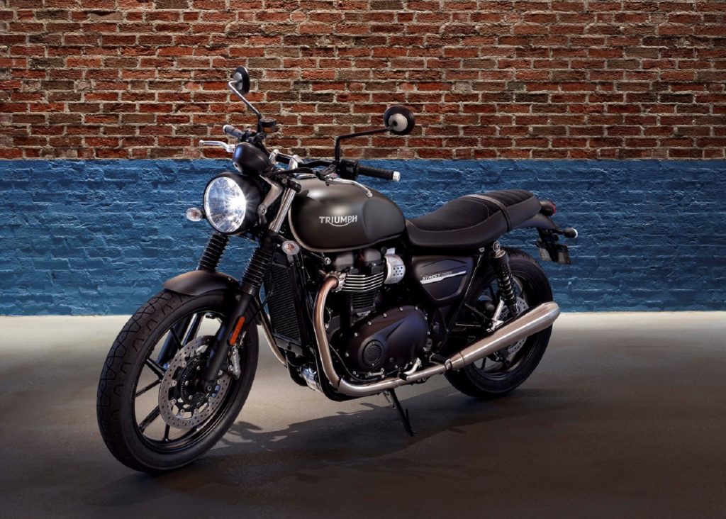 Gray 2020 Triumph Street Twin parked in front of a brick wall