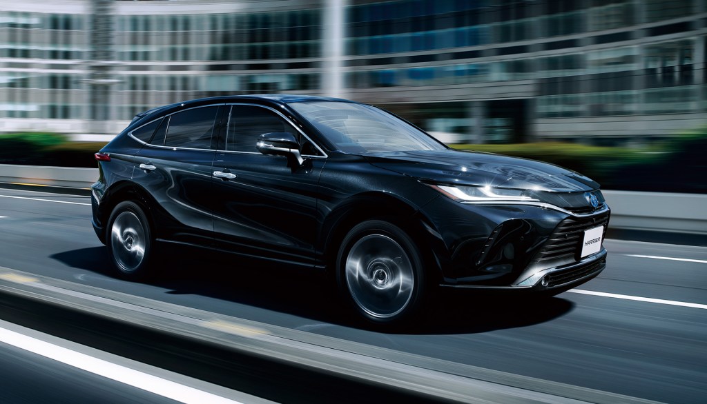 Toyota Harrier driving on street