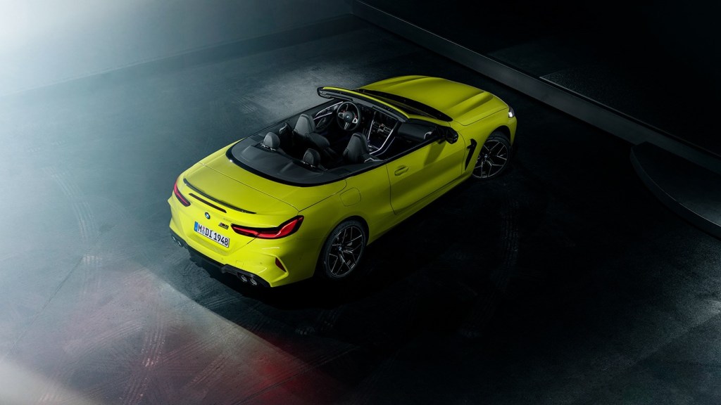 2021 BMW M8 convertible overhead shot with top down painted in birch green