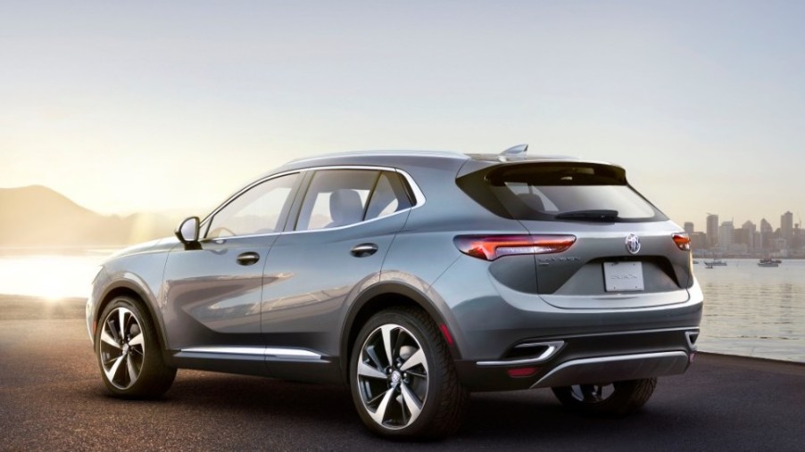 20201 Buick Envision in silver rear 3/4 view sitting on dock