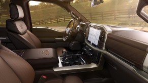 The interior of the 2021 Ford F-150 Limited, showing brown leather upholstery