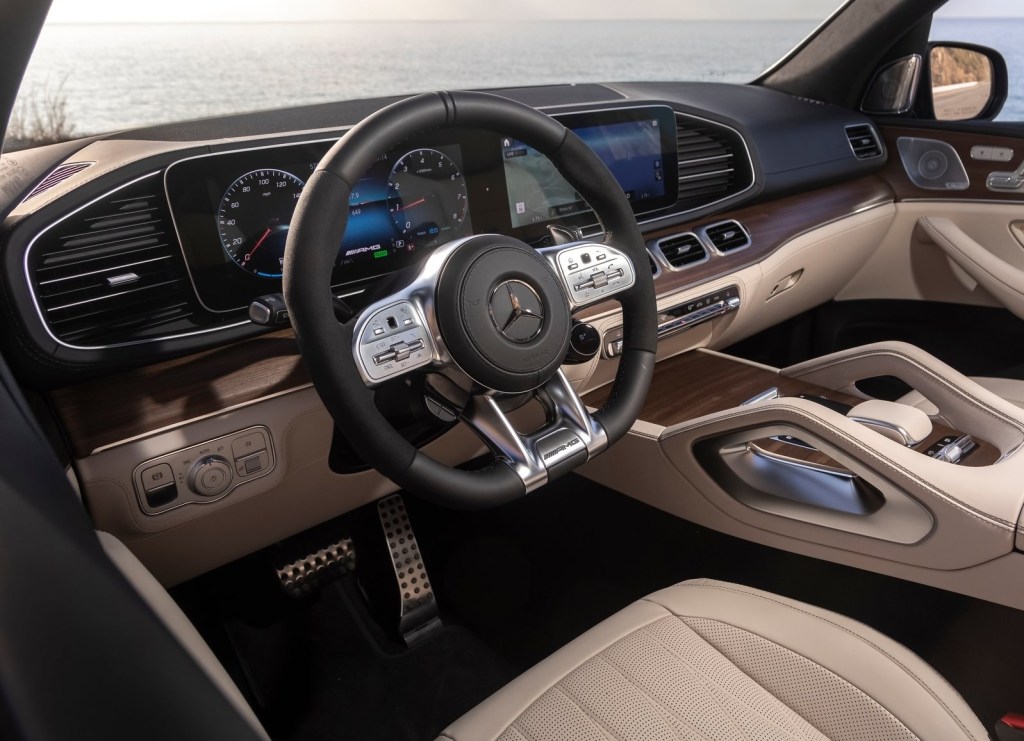 2021 Mercedes-AMG GLS 63 front interior, with tan leather seats and wood trim