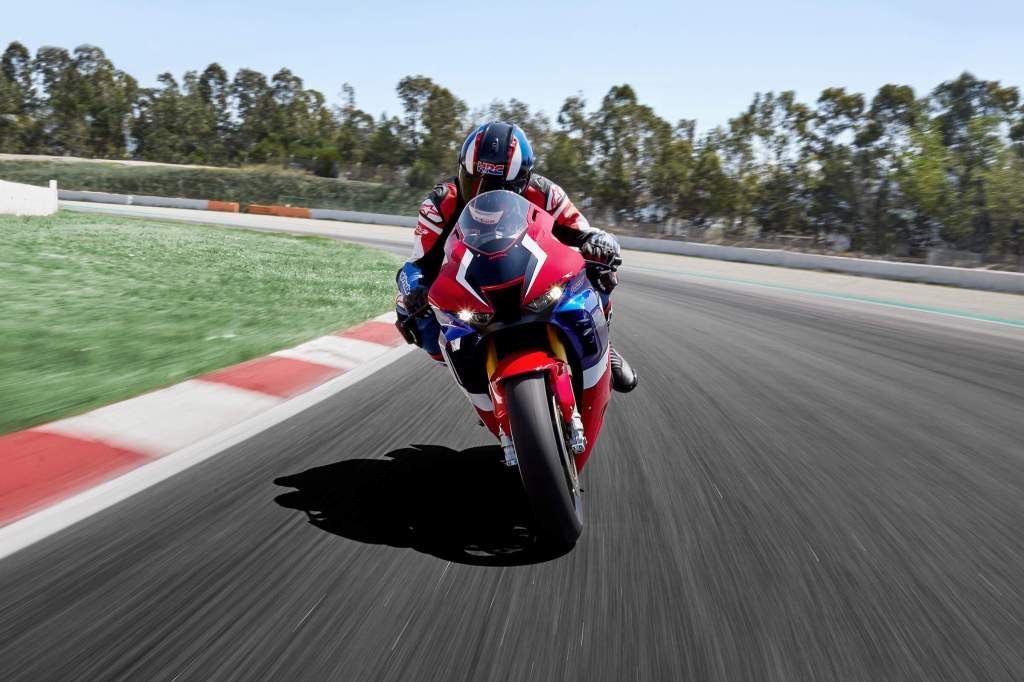 a front view image of a red, white, and blue Honda Fireblade sport bike