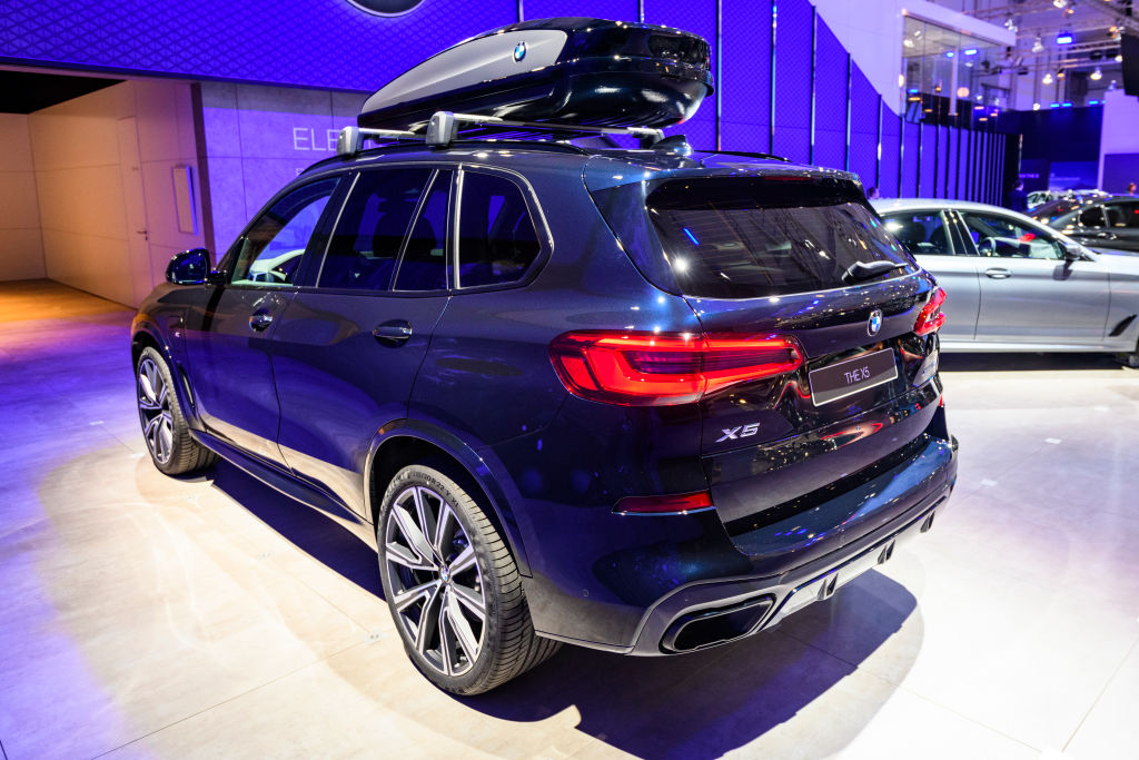 A new BMW X5 on display at an auto show