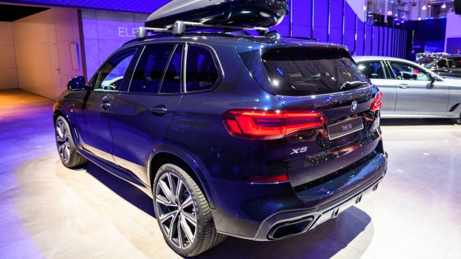 A new BMW X5 on display at an auto show