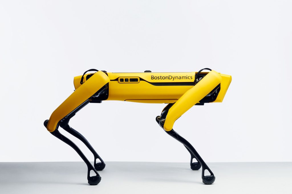 side view of yellow robot dog