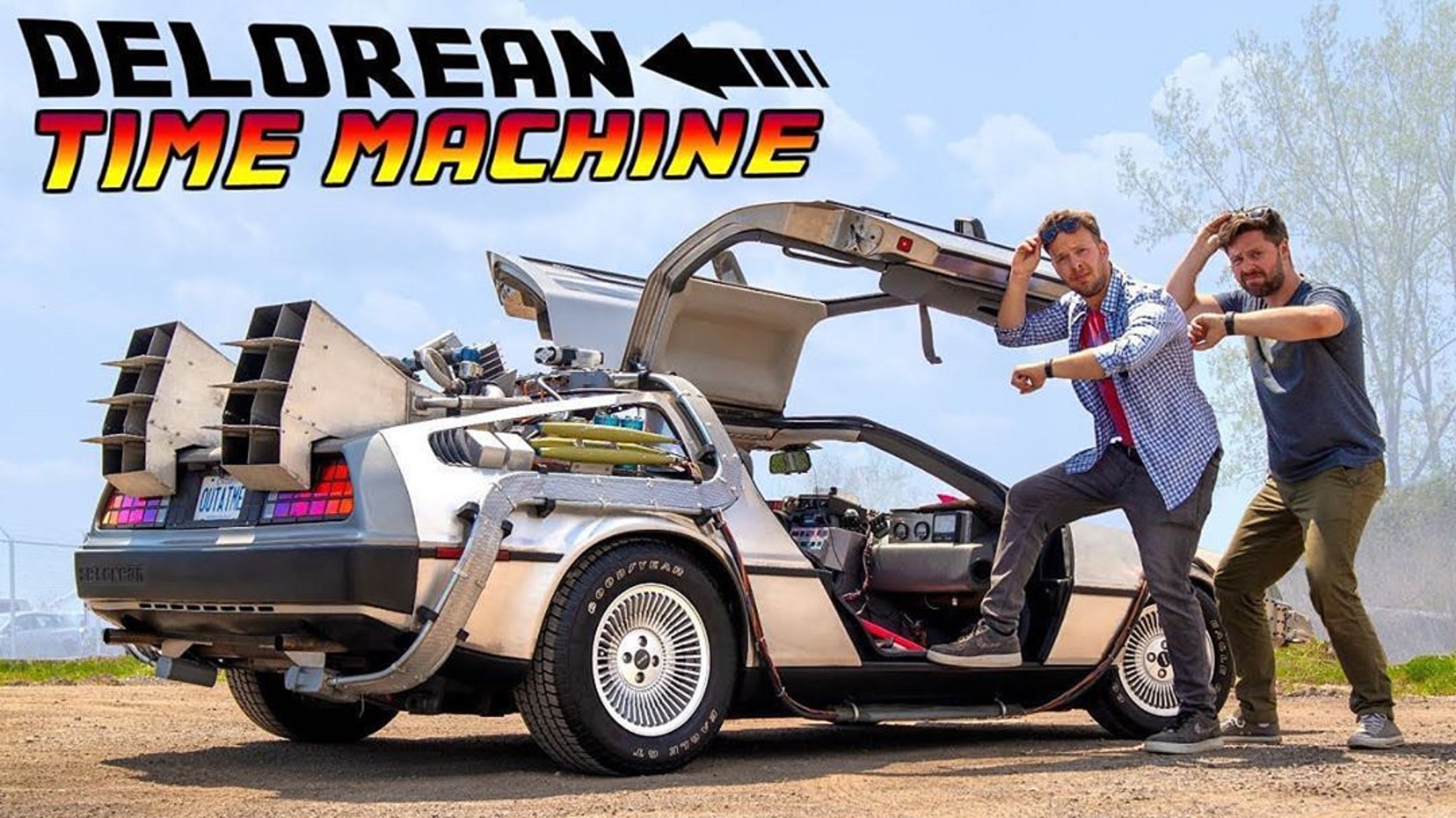 Back to the Future replica DeLorean time machine with Throttle House hosts posing in front