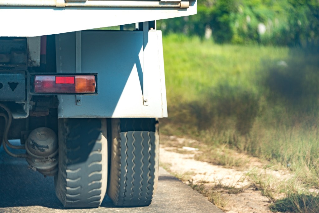 dirty diesel exhaust from back of truck