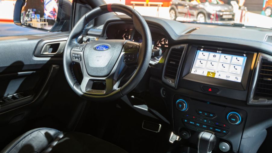 A Ford F-150 Raptor's interior on display