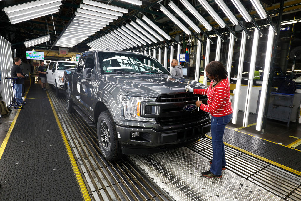 Ford F-150 trucks go through the customer acceptance line at the Ford Dearborn Truck Plant
