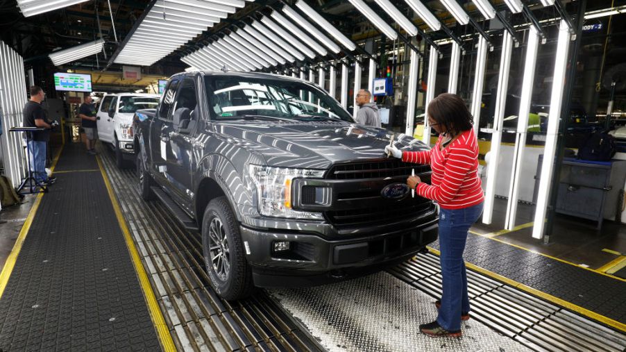 Ford F-150 trucks go through the customer acceptance line at the Ford Dearborn Truck Plant
