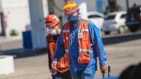 Ford employees walking into work with masks on