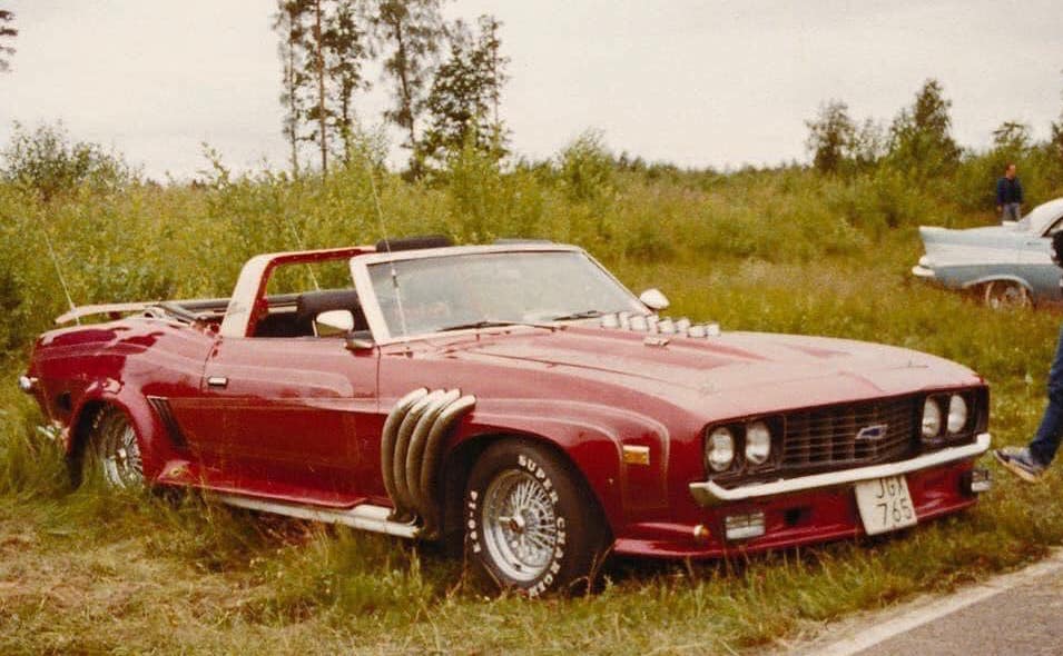 badly done 1969 Camaro with many accessories bolted to the body