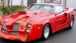 Messed up red late-1970s Camaro