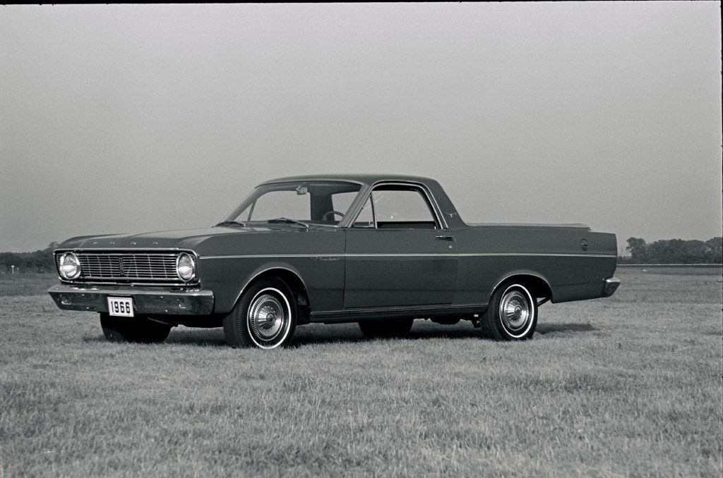 A 1966 Ford Ranchero sitting in a field
