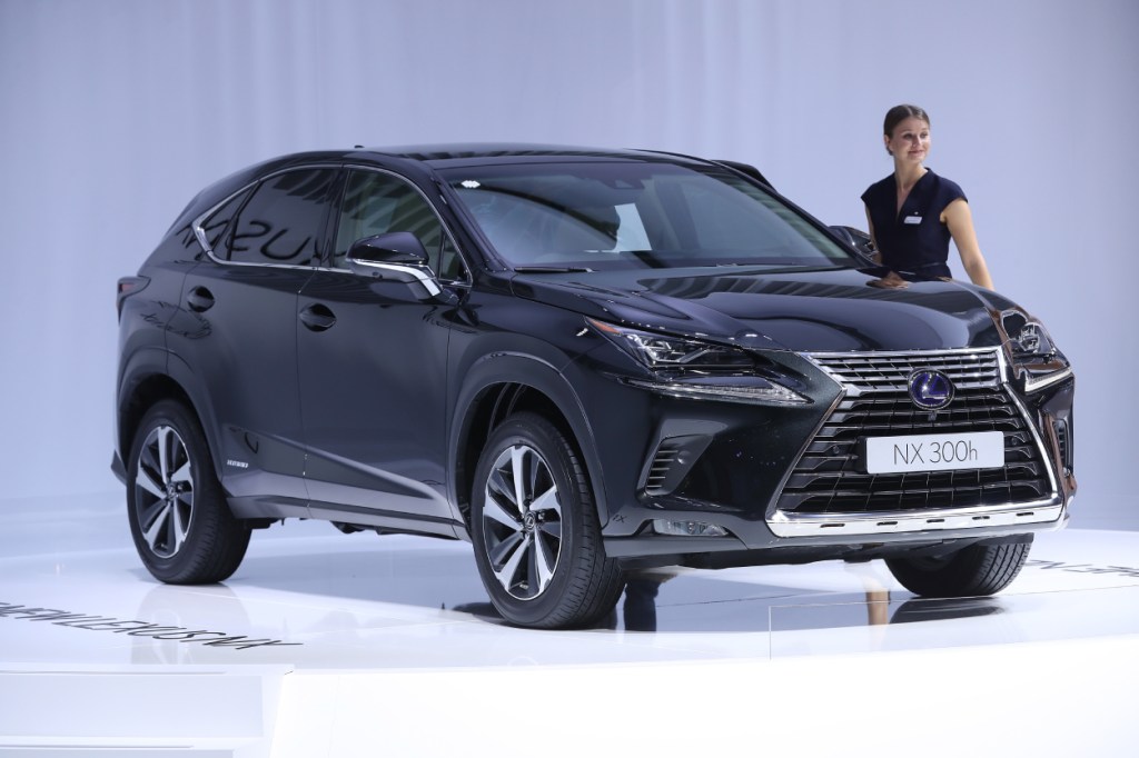 A new Lexus NX 300h on display at an auto show