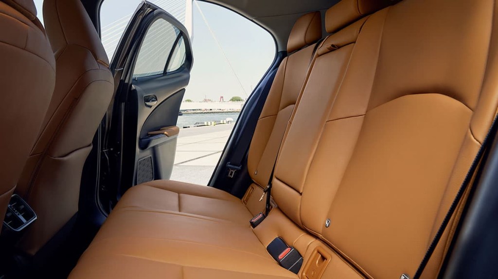 The UX's back row with tan leather seats.