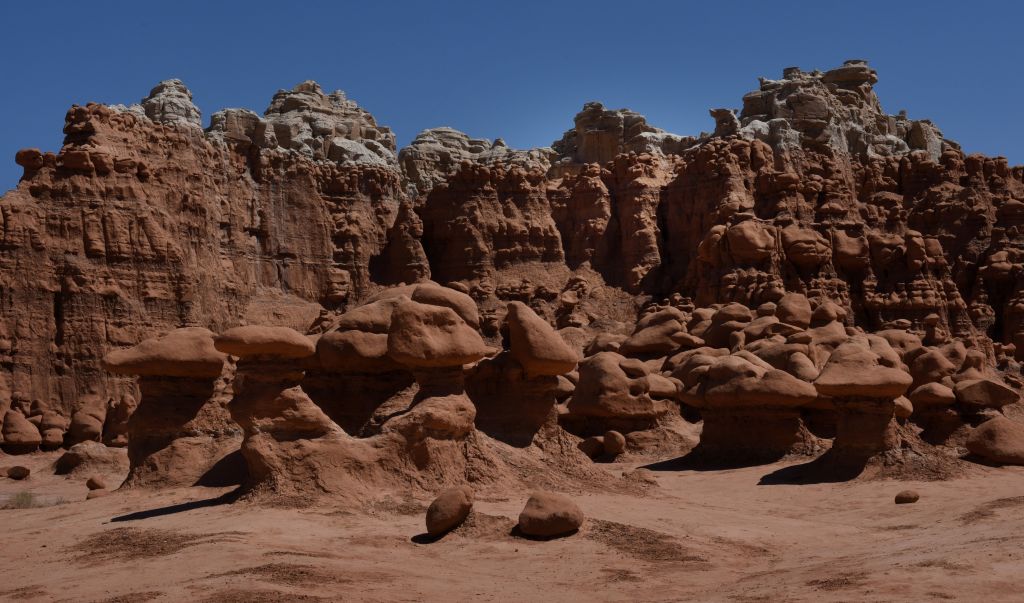 Rock sculptures formed by erosion in the Goblin Valley State Park near Moab, Utah on April 25, 2018. - The park has thousands of rock formations, known locally as "goblins", which are mushroom-shaped rock pinnacles that can be up to several metres high. (Photo by Mark Ralston / AFP)        (Photo credit should read MARK RALSTON/AFP via Getty Images)