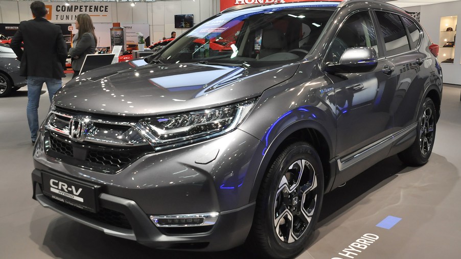 A gray Honda CR-V on display at an auto show