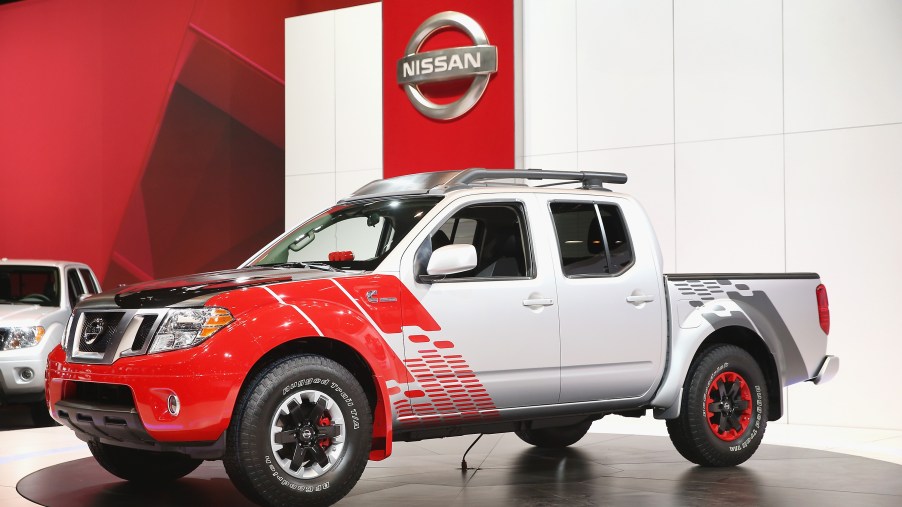 A Nissan Frontier on display at an auto show