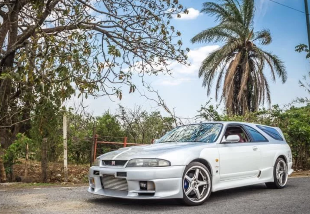 Skyline converted into a wagon front 3/4 view in front of palm tree