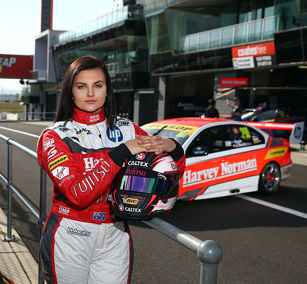 Renee Gracie poses with her racing sedan at Bathurst, Australia