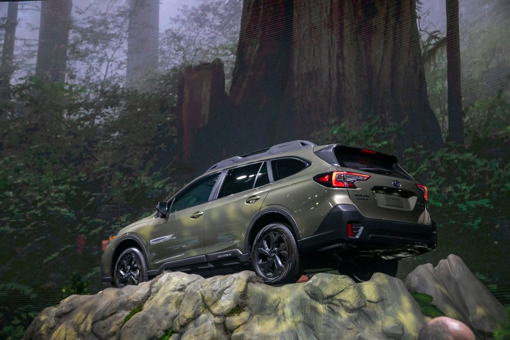 The 2020 Subaru Outback, which costs average in terms of maintenance, is seen in a U.S. National Park-themed display at AutoMobility LA
