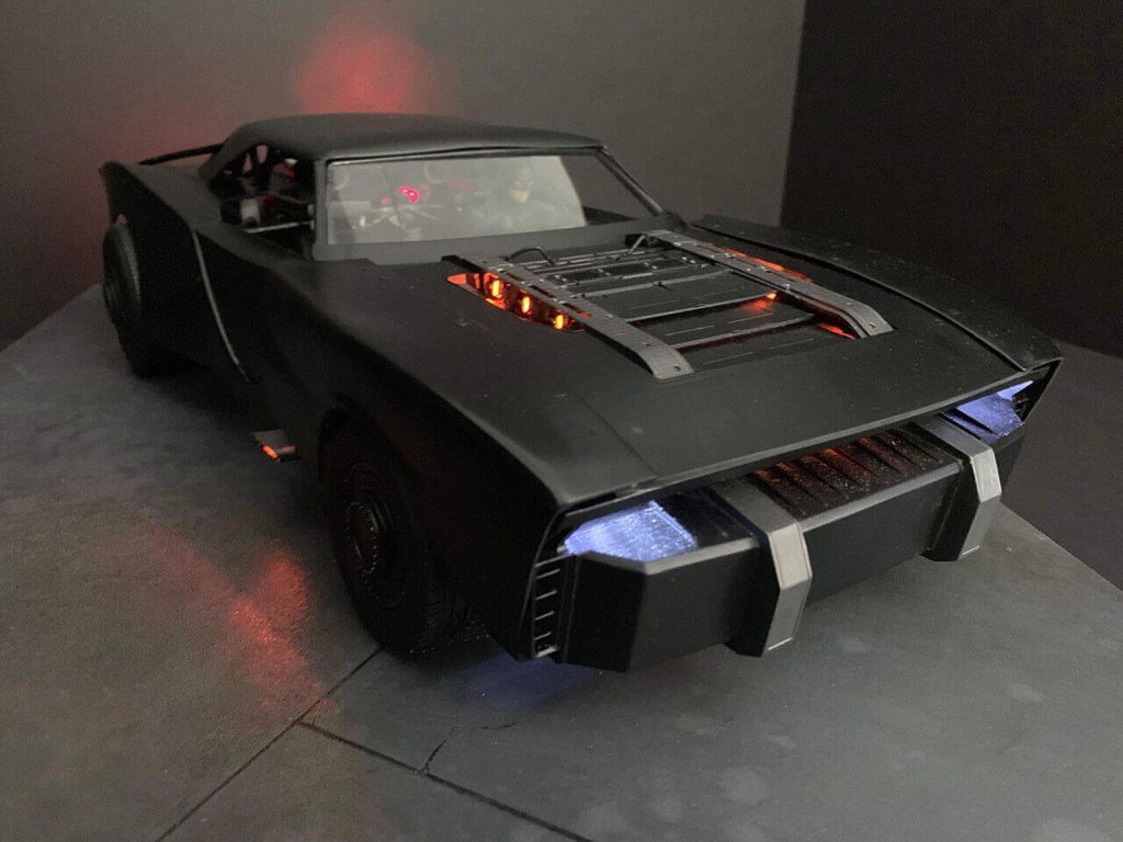 The Batman Batmobile 2021 | front 3/4 view with headlights on Frost