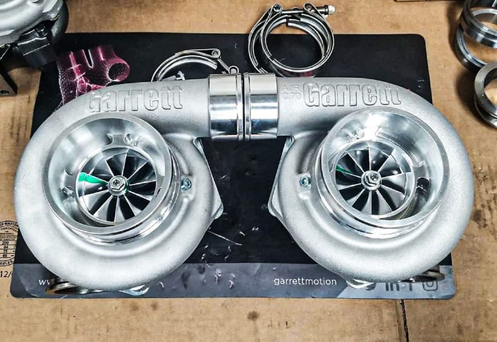 Two Two Garrett GTX3582R Gen II turbochargers laid next to each other
