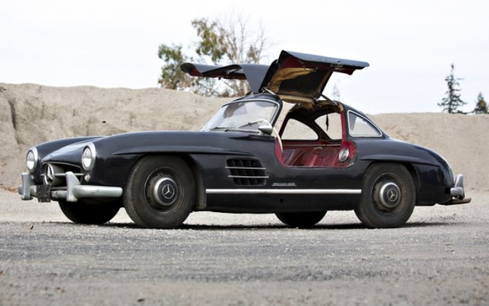 Black unrestored 1956 Mercedes-Benz 300SL Gullwing with its doors up
