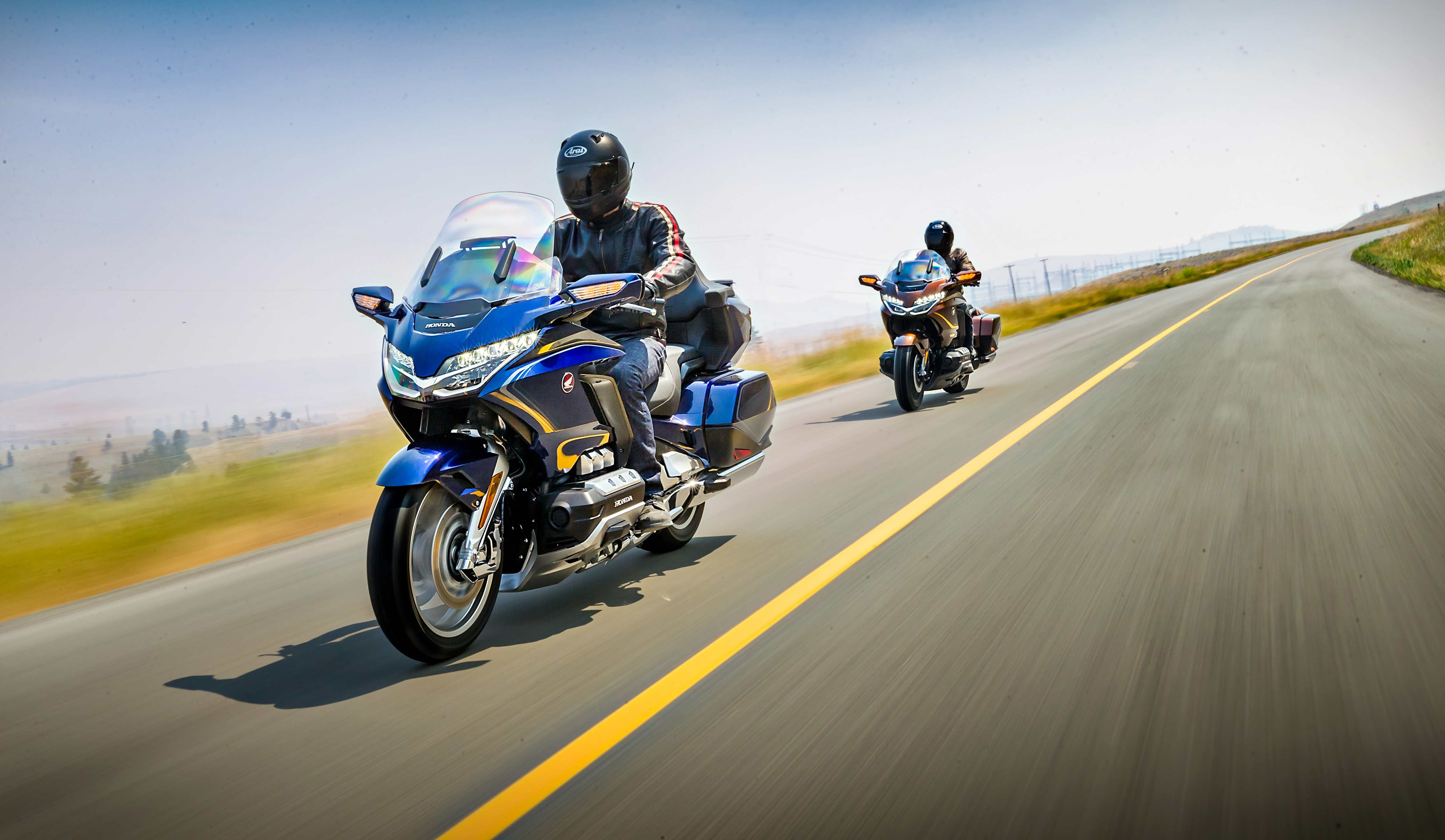 a pair of riders mounted on 2020 Honda Gold Wing touring bikes