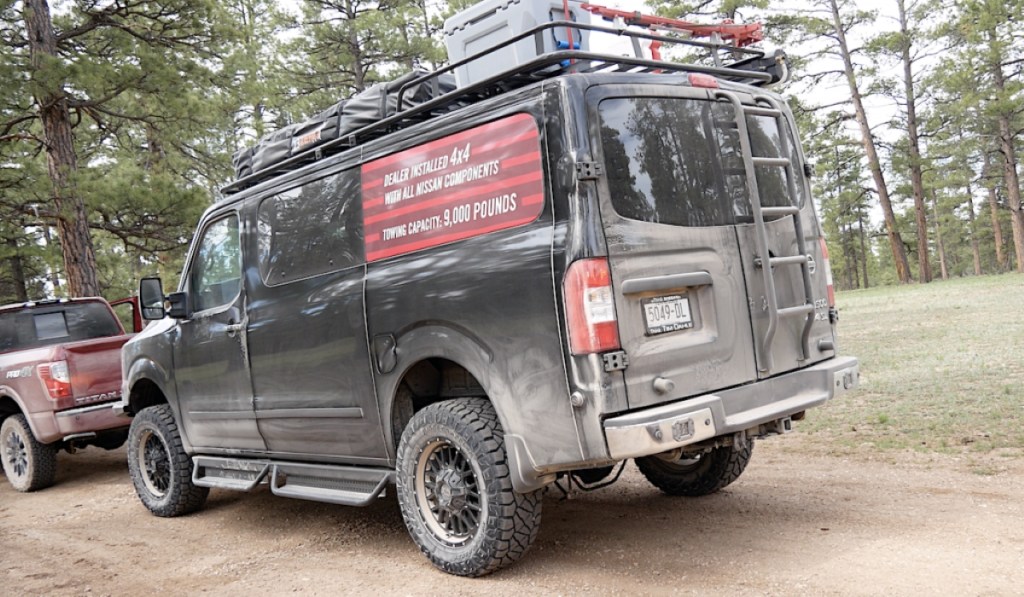 Pic of the rear of an overlanding conversion on a Nissan van