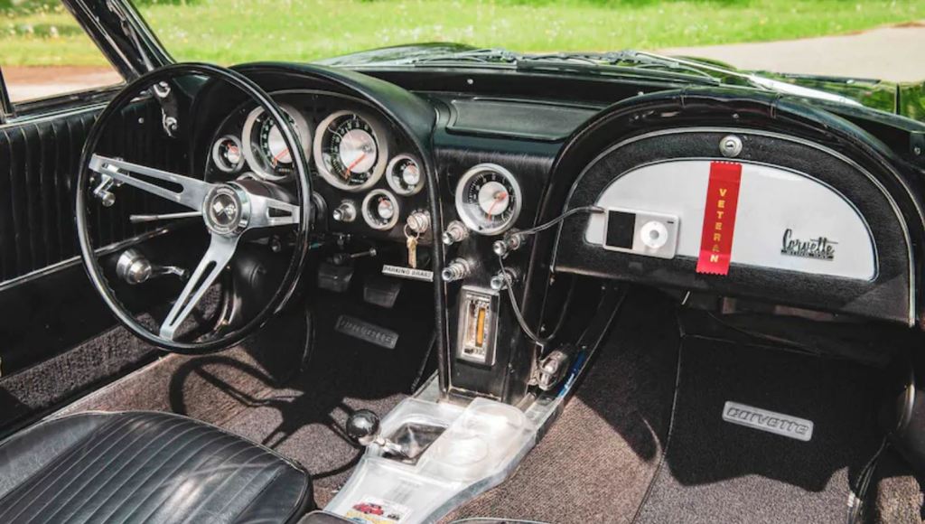 This view is of the black interior of the black 1963 Corvette.